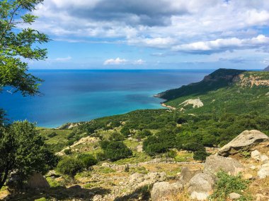 Cinaralti location in Tepeky, a Greek village in Gkeada, Imbros the magnificent Aegean Sea, the view of the mountains and cloud clusters