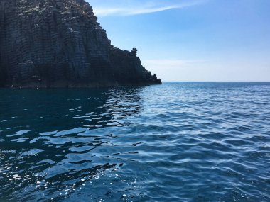 Gkeada Volcanic rock formations along the sea strip in Gkeada. Local people call these rock forms Cheese cliffs. Canakkale Turkey