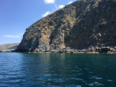 Gkeada Volcanic rock formations along the sea strip in Gkeada. Local people call these rock forms Cheese cliffs. Canakkale Turkey
