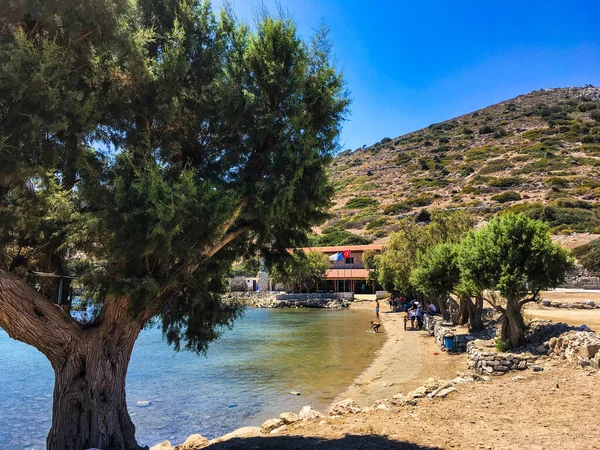 People enjoying the sea and the beach of the ancient city of Knidos on the Knidos Data Peninsula, Mula, TURKEY