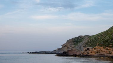 Gökçeada 'da gün batımında, Yunanca adı Arcadia olan Yıldız Koy plajı, Gökçeada' da popüler bir plajdır. Çanakkale, Türkiye