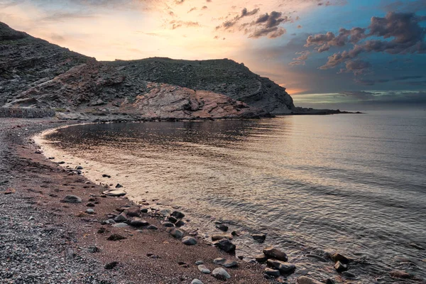 stock image Yildizkoy beach view from the green hills of Gokceada at sunset,  Yildizkoy coast is the one of popular beach in Gokceada. Canakkale, Turkey