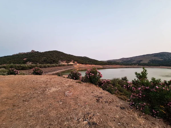 stock image Aydincik little pond and green hills in Gokceada. Lakes in Gokceada. Canakkale, Turkey.