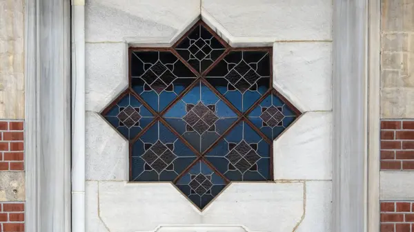 Traditional Ottoman-patterned stained glass window at Sirkeci train station in Istanbul. Orient Express, Istanbul, Turkey.