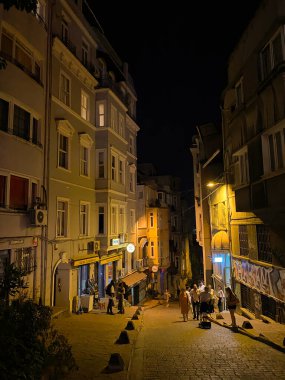Istanbul, Turkey, August 20,2023 Night view of the narrow streets of Taksim, Beyoglu. Taksim is a popular destination for tourists and locals of Istanbul.
