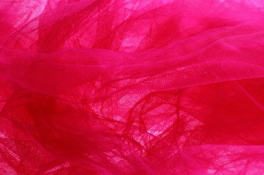 Dalgalı ve yumuşak soyut dantel desenli kırmızı tül kumaş..