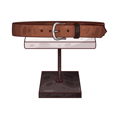 Masadaki kemer, işçiliğine, dokusuna ve toka tasarımına dikkat çekiyor. Deri, kumaş veya sentetik malzemeden yapılan kemerde dikiş, kabartma veya damgalama ayrıntıları yer alabilir.. 