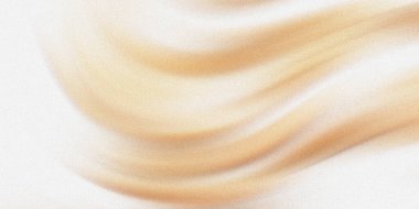 Bu resim bej ve beyaz bir gradyanı olan yumuşak örtülü bir kumaşı sergiliyor. Doku biraz bulanık, ona lüks ve zarif bir his veriyor. Yumuşak eğriler görsel olarak çekici soyut bir tasarım yaratır.