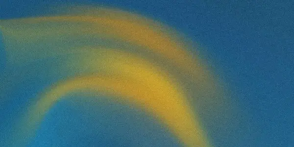 Sarı ve mavi gradyan ile soyut tanecikli doku modern bir arkaplan oluşturuyor