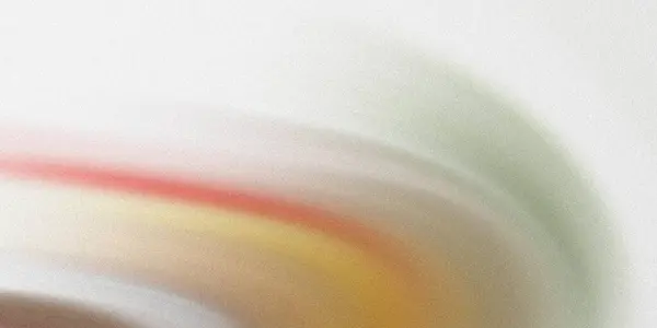 Yumuşak, bulanık bir görüntü. Beyaz bir arkaplanda pastel bir kıvrım var. Renkler nazikçe karışıyor, sakinleştirici ve rüya gibi bir etki yaratıyor..