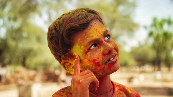 stock image Happy Asian Kid Baby Girl Having Fun With Non Toxic Herbal Holi Color Powder Called Gulal Or Abir Rang Abeer During Hindu Ritual Dol Purnima. Holiday Outdoor Fun Activity