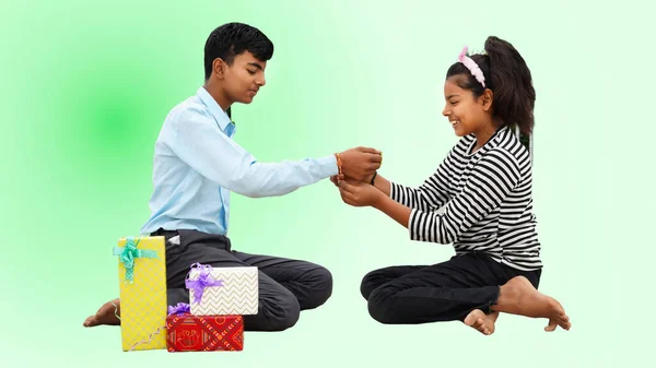 Cute Little Indian Sister Tying Rakhi Her Brother Wrist Exchanging — Stock Photo, Image