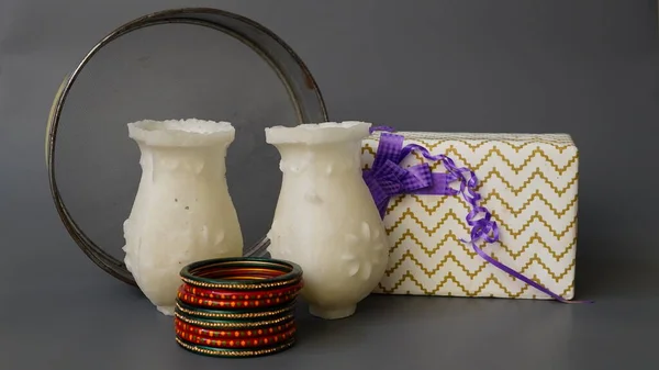 Sugar Karwa and bangles with gifts, Happy Karwa Chauth festival, a one-day festival celebrated by Hindu women in India.