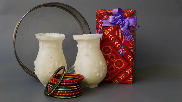 Sugar Karwa and bangles with gifts, Happy Karwa Chauth festival, a one-day festival celebrated by Hindu women in India.