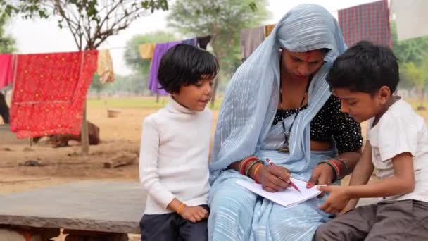 Indian Mother Son Daughter Learning Write Adult Woman Teaches Child — Stock Video