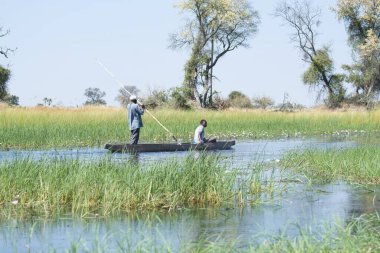 Sudaki balıkçılar.