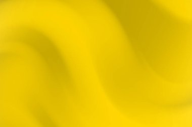 Akan kıvrımlarla soyut sarı zemin, sıcak ve canlı bir atmosfer yaratıyor.