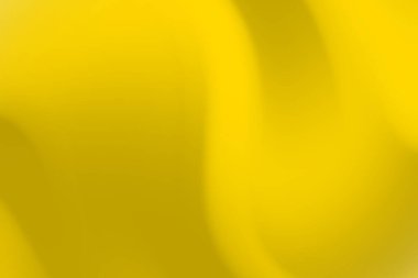 Yaratıcı projeler için sıcaklığı ve enerjiyi çağrıştıran pürüzsüz gradyanlarla soyut sarı arkaplan