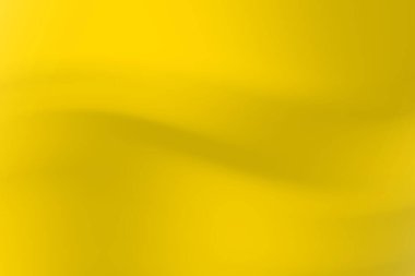 Pürüzsüz dalgalarla soyut sarı zemin, canlı ve enerjik bir atmosfer yaratıyor.