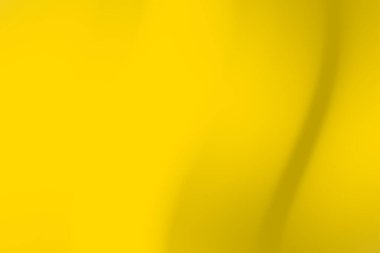 Pürüzsüz eğrileri olan canlı sarı soyut arkaplan, tasarım ve markalaşma kullanımı için ideal