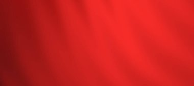 Canlı kırmızı kumaş zarif bir şekilde örtülmüş, yumuşak bir zemine karşı zengin bir doku oluşturmuş.