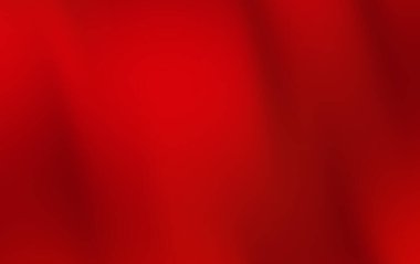 Canlı kırmızı kumaş yumuşakça örtülmüş, zengin bir doku ve derinlik yaratmış, arka plan için ideal.