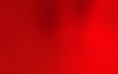 Yumuşak katlı canlı kırmızı kumaş dokusu, arka plan veya tekstil tasarım projeleri için idealdir