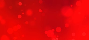 Yumuşak bokeh daireli soyut kırmızı arkaplan tasarım kullanımı için sıcak bir atmosfer yaratıyor