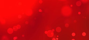Yumuşak bokeh ışıkları olan soyut kırmızı arkaplan sıcak ve canlı bir atmosfer yaratıyor
