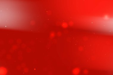 Yumuşak bokeh ışıkları olan soyut kırmızı arkaplan sıcak ve canlı bir atmosfer yaratıyor