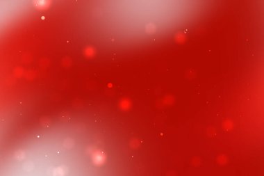 Yumuşak bokeh ışıklarıyla soyut kırmızı arka plan sıcak, şenlikli bir atmosfer yaratıyor