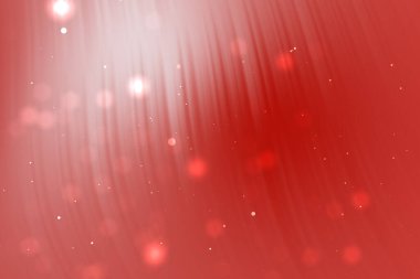 Yumuşak eğimli, soyut kırmızı arkaplan ve parlayan bokeh ışıkları, sıcak bir atmosfer yaratıyor.