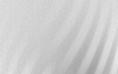 Yumuşak gri tonlarda pürüzsüz, akışkan kumaşın soyut dokusu, sakin bir arka plan atmosferi yaratır.