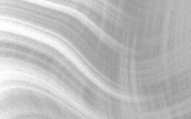 Soyut monokrom dalga desenleri dokulu bir arka planda pürüzsüz bir şekilde akıyor, sakin bir atmosfer yaratıyor.