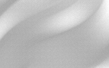 Gri kumaşın soyut yumuşak dalgaları hafif ışık yansımalarıyla pürüzsüz bir doku yaratıyor.