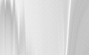 Yumuşak eğimli soyut doku ve ışıktaki ince değişimler tasarım için sakin bir arkaplan oluşturur.