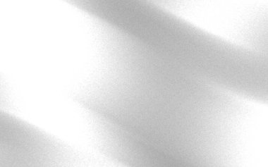 Yumuşak ışığın soyut dalgaları minimalist bir ortamda hafif eğimlerle sakin bir atmosfer yaratıyor.