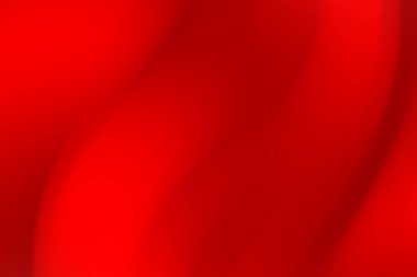 Soyut kırmızı dalgalar dinamik bir akış yaratıyor, minimalist bir tasarımda enerji ve sıcaklık uyandırıyor.