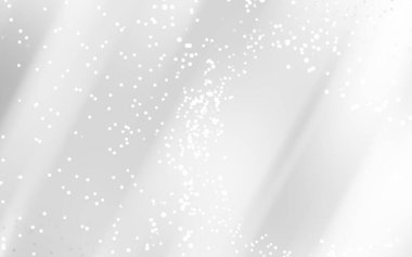 Yumuşak eğimli soyut beyaz arkaplan ve dağınık ışık parçacıkları rüya gibi bir etki yaratıyor