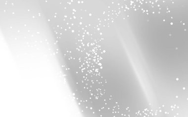 Yumuşak beyaz bokeh ışıklarıyla soyut bir arkaplan rüya gibi bir atmosfer yaratıyor