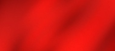 Yumuşak kıvrımları ve gölgeleri olan canlı kırmızı kumaş, arka planlar için zengin bir doku yaratıyor.