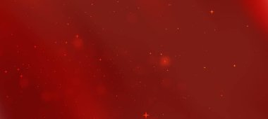 Yumuşak ve parlak parçacıkların oluşturduğu soyut kırmızı arkaplan sıcak ve davetkar bir atmosfer yaratıyor