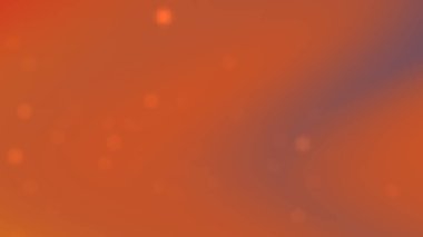 Yumuşak bokeh ışıklarının oluşturduğu soyut turuncu eğimli arka plan sıcak bir ortam yaratıyor