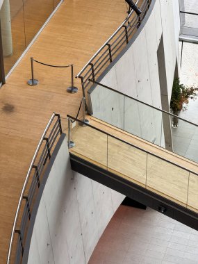 Detail of a contemporary pedestrian interior bridge with wood and metal structure in Copenhagen, Denmark.