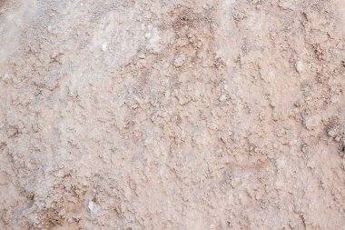 Üstten Görünüm bir karanlık zemin yüzey. Kir ve taşların makro görünümü kapatın. Toprak arka plan metin alanı ile.