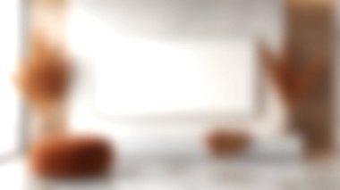 Sıcak renklere ve şık aksanlara sahip, rahatlama ve modern yaşam için ideal, rahat bir dekorun bulunduğu zarif bir minimalist oturma odası keşfedin..