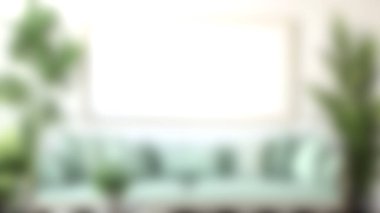 Nane yeşili bir kanepenin olduğu rahat bir oturma odası yumuşak yastıklarla bezenmiş, canlı iç mekan bitkileriyle çerçevelenmiş, sakin ve davetkar bir atmosfer yaratıyor..