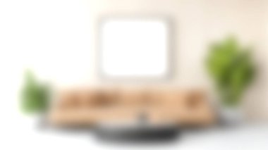 Bej bir kanepe, yuvarlak masa ve tencerelerde dekoratif bitkiler bulunan, sanat için hazırlanmış boş bir duvar çerçevesi olan modern bir minimalist oturma odası..