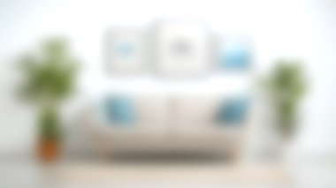 Parlak ve havadar oturma odasında şık bir kanepe dekoratif yastıklar ve çerçeveli sanat eserleri var. Yeşilli yeşil bitkiler modern dekora huzur verici bir dokunuş katıyor..