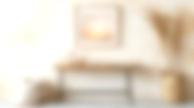 Konforlu bir oturma odası, ahşap bir masa, şık bir duvar sanatı, bir bitki ve dekoratif unsurlar, davetkar ve sıcak bir atmosfer yaratıyor..